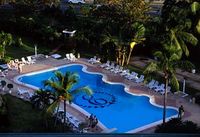 The pool by night of the Hotel CALYPSO BEACH - Boca Chica - Dominican Republic